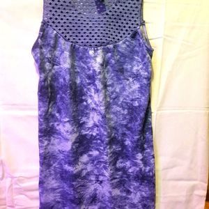 Girls dress with crochet lace detail at neck